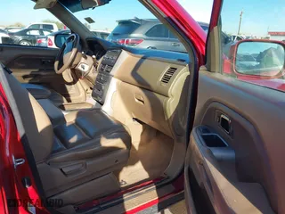 2006 Honda Pilot EX-L with RES with VIN 2HKYF186X6H509492, listed as a IAAI auction lot 41831784 with 228,948 mi miles. Bid and sale history available at carsss.com. Image 5.