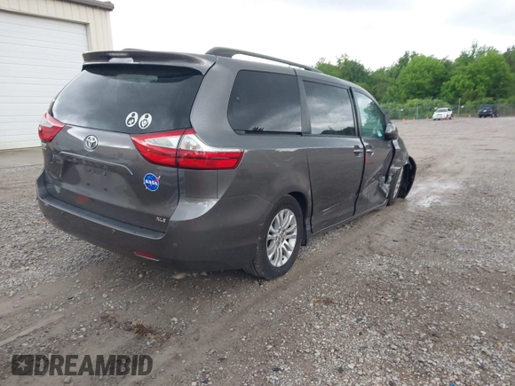 2016 Toyota Sienna XLE with VIN 5TDYK3DC8GS721290, listed as a IAAI auction lot 42127035 with 142,150 mi miles and . Bid and sale history available at DreamBid. Image 4.