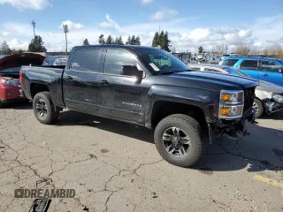 2015 Chevrolet Silverado 1500 LT with VIN 3GCUKREC9FG223208, listed as a Copart auction lot 47499695 with 173,163 mi miles and Salvage Title. Bid and sale history available at carsss.com. Image 4.