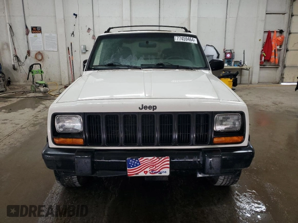 1997 Jeep Cherokee Sport with VIN 1J4FJ68S2VL518188, listed as a Copart auction lot 77459464 with 0 mi miles and Non Repairable. Bid and sale history available at carsss.com. Image 5.