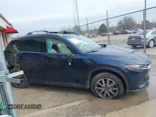 2018 Mazda CX-5 Grand Touring with VIN JM3KFADM1J1439544, listed as a IAAI auction lot 41891134 with 54,132 mi miles and . Bid and sale history available at DreamBid. Image 13.