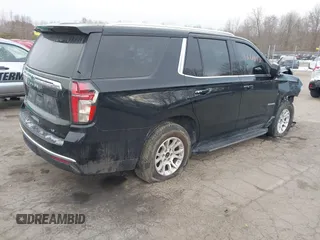 2021 Chevrolet Tahoe LT z VIN 1GNSKNKD2MR444988, wystawiony jako IAAI lot #41372873 z przebiegiem 45 731 mil mil oraz . Historia ofert i sprzedaży dostępna na DreamBid. Obrazek 4.