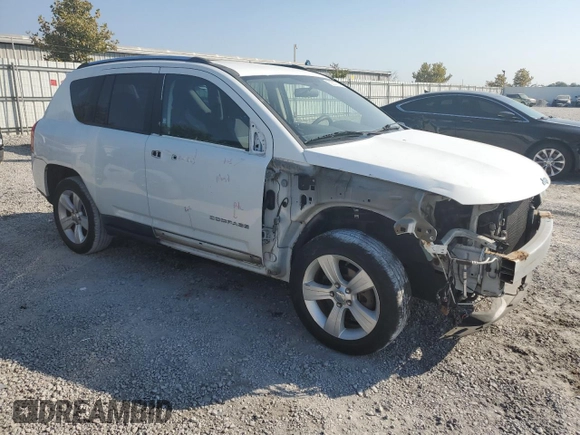 2011 Jeep Compass with VIN 1J4NT1FA3BD240927, listed as a Copart auction lot 69377574 with 71,061 mi miles and Salvage Title. Bid and sale history available at carsss.com. Image 4.