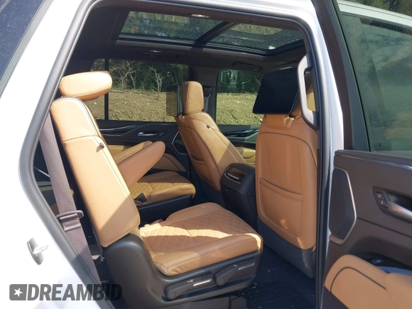2023 Cadillac Escalade 4WD Sport z VIN 1GYS4EKL9PR394714, wystawiony jako IAAI lot #42074356 z przebiegiem 48 404 mil mil oraz . Historia ofert i sprzedaży dostępna na DreamBid. Obrazek 8.