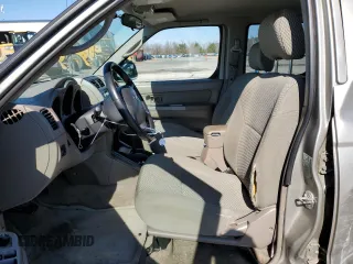 2002 Nissan Frontier SE with VIN 1N6ED29XX2C365791, listed as a Copart auction lot 45404255 with 150,903 mi miles and Salvage title. Bid and sale history available at DreamBid. Image 7.