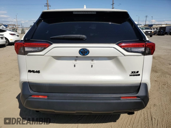 2022 Toyota RAV4 Hybrid XLE Premium with VIN JTMB6RFV1ND521761, listed as a Copart auction lot 52150265 with 46,391 mi miles and Salvage title. Bid and sale history available at DreamBid. Image 6.