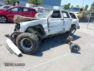 2001 Jeep Cherokee Sport z VIN 1J4FF48S11L596106, wystawiony jako IAAI lot #42213850 z przebiegiem Nie podano mil oraz . Historia ofert i sprzedaży dostępna na DreamBid. Obrazek 17.