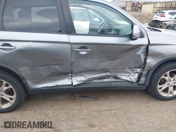 2015 Mitsubishi Outlander SE with VIN JA4AZ3A39FZ007936, listed as a IAAI auction lot 41003206 with 136,017 mi miles and . Bid and sale history available at DreamBid. Image 6.