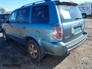 2006 Honda Pilot EX-L with VIN 5FNYF18536B017084, listed as a IAAI auction lot 41899517 with 999,999 mi miles. Bid and sale history available at carsss.com. Image 3.