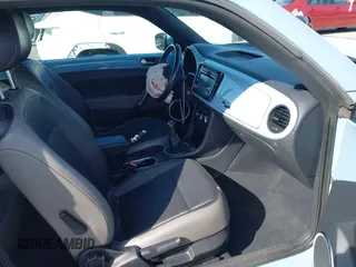 2013 Volkswagen Beetle with VIN 3VWHX7AT4DM667136, listed as a IAAI auction lot 41855778 with 120,300 mi miles and . Bid and sale history available at DreamBid. Image 5.