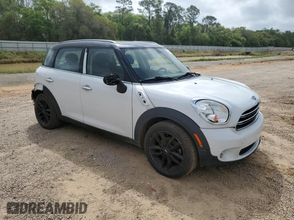 2015 MINI Countryman with VIN WMWZB3C52FWM33204, listed as a Copart auction lot 51680405 with 154,839 mi miles and Salvage Title. Bid and sale history available at DreamBid. Image 4.