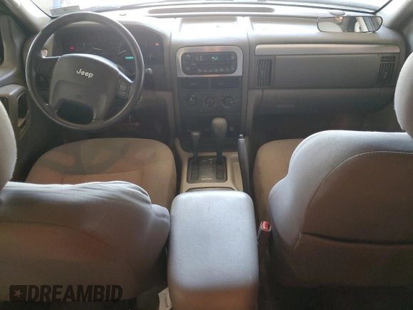 2004 Jeep Grand Cherokee Laredo z VIN 1J4GW48S14C338788, wystawiony jako Copart lot #53136715 z przebiegiem 150 352 mil mil oraz Szkoda całkowita • Salvage title. Historia ofert i sprzedaży dostępna na DreamBid. Obrazek 8.