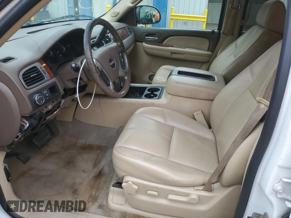 2009 GMC Yukon SLT w/4SA with VIN 1GKEC33349R265859, listed as a Copart auction lot 74012784 with 153,394 mi miles and Clean Title. Bid and sale history available at carsss.com. Image 7.