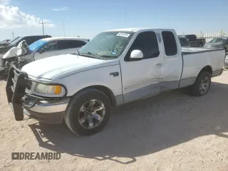 2003 Ford F-150 with VIN 2FTRX17L73CA05377, listed as a Copart auction lot 48744315 with 217,865 mi miles and Salvage title. Bid and sale history available at DreamBid. Image 1.