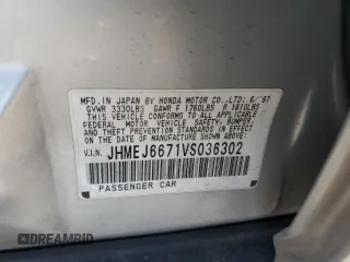 1997 Honda Civic LX z VIN JHMEJ6671VS036302, wystawiony jako Copart lot #54006905 z przebiegiem 201 909 mil mil oraz Szkoda całkowita • Salvage title. Historia ofert i sprzedaży dostępna na DreamBid. Obrazek 12.