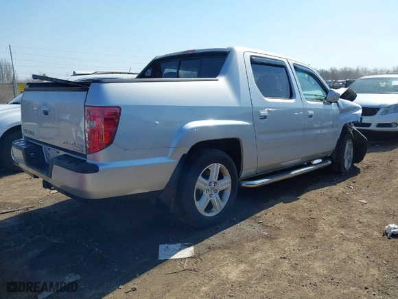 2009 Honda Ridgeline RTL with VIN 2HJYK16519H502977, listed as a IAAI auction lot 41774503 with 206,319 mi miles. Bid and sale history available at carsss.com. Image 4.