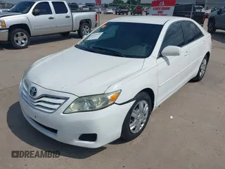 2010 Toyota Camry with VIN 4T1BF3EK2AU555959, listed as a IAAI auction lot 42153472 with 288,387 mi miles and . Bid and sale history available at DreamBid. Image 2.