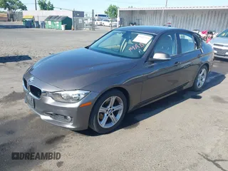 2014 BMW 3 Series 328i with VIN WBA3C1C57EK116483, listed as a IAAI auction lot 42697759 with 113,010 mi miles and . Bid and sale history available at DreamBid. Image 2.