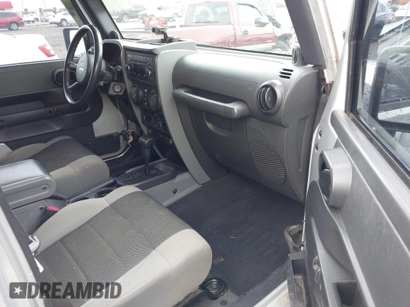 2007 Jeep Wrangler Unlimited X with VIN 1J4GA39187L209448, listed as a IAAI auction lot 42104328 with 138,302 mi miles and . Bid and sale history available at DreamBid. Image 5.