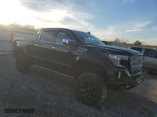 2020 GMC Sierra 1500 Denali with VIN 1GTU9FEL5LZ106974, listed as a Copart auction lot 83200414 with 33,119 mi miles and Salvage Title. Bid and sale history available at carsss.com. Image 4.