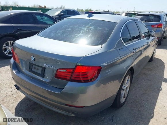 2012 BMW 5 Series 528i with VIN WBAXG5C50CDX06006, listed as a IAAI auction lot 41862588 with 159,221 mi miles. Bid and sale history available at carsss.com. Image 4.
