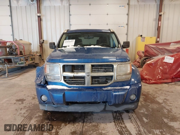 2007 Dodge Nitro SLT with VIN 1D8GU58KX7W614584, listed as a IAAI auction lot 41036412 with 177,523 mi miles. Bid and sale history available at carsss.com. Image 12.