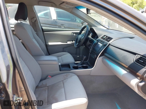 2016 Toyota Camry XLE with VIN 4T4BF1FK4GR581867, listed as a IAAI auction lot 42002126 with 74,811 mi miles. Bid and sale history available at carsss.com. Image 5.