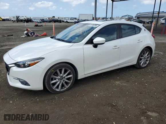 2017 Mazda 3 Grand Touring with VIN JM1BN1M37H1116869, listed as a Copart auction lot 51706765 with 86,334 mi miles and Salvage Title. Bid and sale history available at DreamBid. Image 1.
