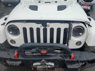 2015 Jeep Wrangler Unlimited Rubicon Hard Rock with VIN 1C4HJWFG8FL647910, listed as a Copart auction lot 46716605 with 48,139 mi miles and Salvage Title. Bid and sale history available at carsss.com. Image 11.