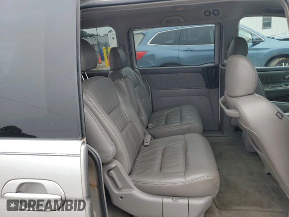 2004 Honda Odyssey EX-L with VIN 5FNRL18044B069774, listed as a Copart auction lot 57096535 with 165,307 mi miles and Salvage title. Bid and sale history available at DreamBid. Image 11.