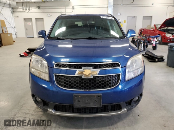 2014 Chevrolet Orlando z VIN KL77P2EK9EK542495, wystawiony jako Copart lot #71786924 z przebiegiem 210 349 mil mil oraz Szkody całkowita. Historia ofert i sprzedaży dostępna na DreamBid. Obrazek 5.