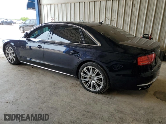 2013 Audi A8 4.0L с VIN WAUR2AFD6DN020907, выставлен на аукционе Copart как лот 54742325 с пробегом 88 042 миль миль и Списание • Salvage title. История ставок и продаж доступна на DreamBid. Изображение 2.