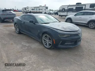2017 Chevrolet Camaro 1LT z VIN 1G1FB1RS4H0158957, wystawiony jako IAAI lot #42060473 z przebiegiem 140 530 mil mil oraz . Historia ofert i sprzedaży dostępna na DreamBid. Obrazek 1.