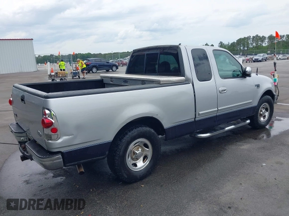 1999 Ford F-150 with VIN 1FTRX17W5XNC01330, listed as a IAAI auction lot 42101633 with 262,374 mi miles and . Bid and sale history available at DreamBid. Image 4.