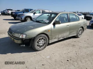 2000 Infiniti G20 Luxury z VIN JNKCP11A5YT311938, wystawiony jako Copart lot #48509185 z przebiegiem 186 595 mil mil oraz Szkoda całkowita • Salvage title. Historia ofert i sprzedaży dostępna na DreamBid. Obrazek 1.