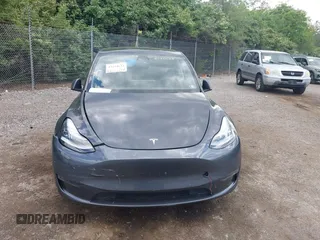 2021 Tesla Model Y Long Range z VIN 5YJYGDEE6MF070068, wystawiony jako IAAI lot #42224634 z przebiegiem 33 850 mil mil oraz . Historia ofert i sprzedaży dostępna na DreamBid. Obrazek 12.