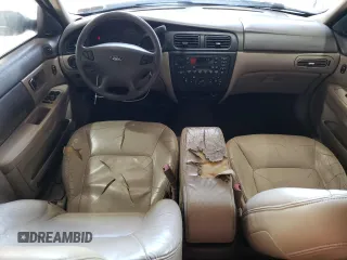 2001 Ford Taurus SE Standard with VIN 1FAHP58S71G184725, listed as a Copart auction lot 56401895 with 163,238 mi miles and Salvage title. Bid and sale history available at DreamBid. Image 8.