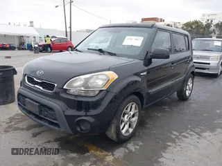 2012 Kia Soul with VIN KNDJT2A59C7748615, listed as a IAAI auction lot 42077867 with 199,114 mi miles. Bid and sale history available at carsss.com. Image 2.