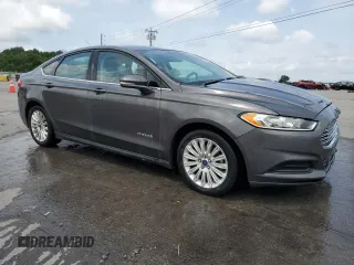 2016 Ford Fusion SE Hybrid с VIN 3FA6P0LU8GR227215, выставлен на аукционе Copart как лот 62669895 с пробегом 249 837 миль миль и Списание • Salvage title. История ставок и продаж доступна на DreamBid. Изображение 4.