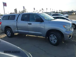2013 Toyota Tundra z VIN 5TFRM5F17DX063683, wystawiony jako IAAI lot #41603196 z przebiegiem Nie podano mil oraz . Historia ofert i sprzedaży dostępna na DreamBid. Obrazek 13.