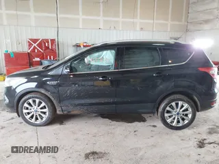 2017 Ford Escape Titanium with VIN 1FMCU0JD2HUE71179, listed as a IAAI auction lot 41465849 with 95,426 mi miles. Bid and sale history available at carsss.com. Image 14.