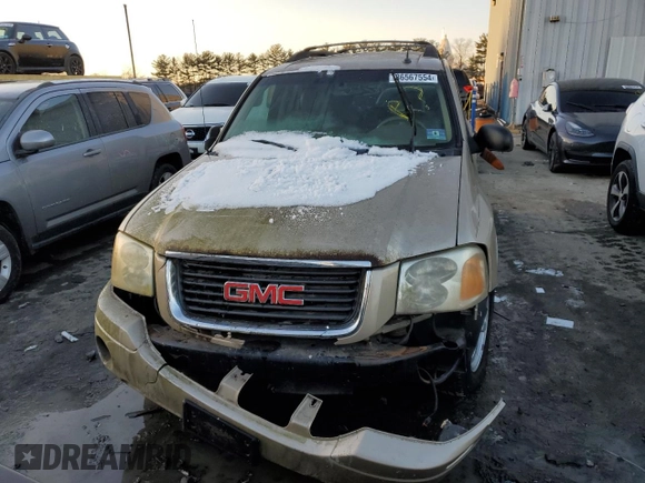 2004 GMC Envoy SLE with VIN 1GKET16S546126499, listed as a Copart auction lot 86567554 with Not provided miles and Salvage title. Bid and sale history available at DreamBid. Image 5.
