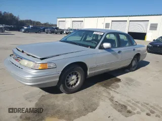 1997 Ford Crown Victoria LX z VIN 2FALP74W5VX234505, wystawiony jako Copart lot #83301884 z przebiegiem 220 590 mil mil oraz Szkoda całkowita • Salvage title. Historia ofert i sprzedaży dostępna na DreamBid. Obrazek 1.