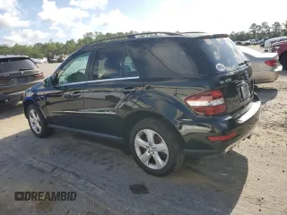 2011 Mercedes-Benz M 350 with VIN 4JGBB2FB5BA744077, listed as a Copart auction lot 61565615 with 125,813 mi miles and Salvage title. Bid and sale history available at DreamBid. Image 2.