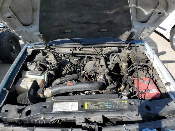 2005 Ford Ranger XLT Appearance with VIN 1FTZR44E15PA78649, listed as a Copart auction lot 77696024 with 146,406 mi miles and Salvage title. Bid and sale history available at DreamBid. Image 11.