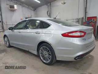 2014 Ford Fusion SE with VIN 3FA6P0H92ER284852, listed as a IAAI auction lot 42104842 with 103,295 mi miles. Bid and sale history available at carsss.com. Image 3.