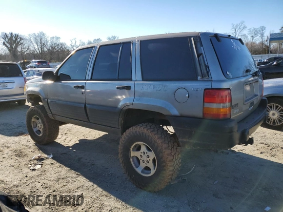 1998 Jeep Grand Cherokee Laredo with VIN 1J4GZ58S5WC295461, listed as a Copart auction lot 41787605 with 185,801 mi miles and Salvage Title. Bid and sale history available at carsss.com. Image 2.