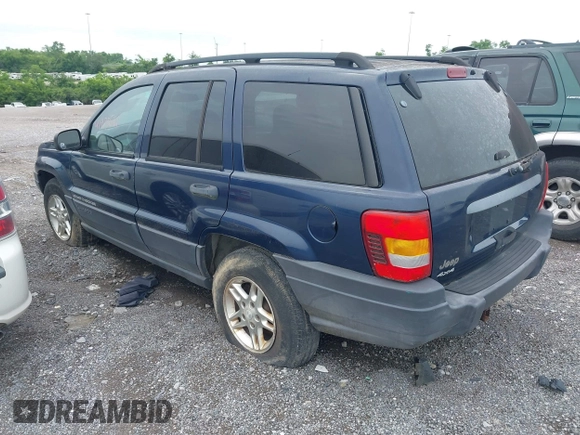 2003 Jeep Grand Cherokee Laredo with VIN 1J4GW48S63C591605, listed as a IAAI auction lot 42389898 with 177,024 mi miles and . Bid and sale history available at DreamBid. Image 3.