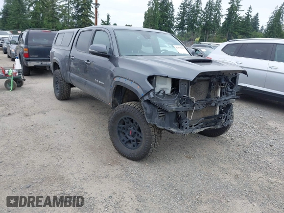 2021 Toyota Tacoma SR5 with VIN 3TMDZ5BN1MM119711, listed as a IAAI auction lot 42479038 with 64,779 mi miles and . Bid and sale history available at DreamBid. Image 1.