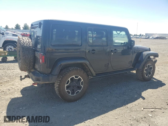 2014 Jeep Wrangler Unlimited Rubicon с VIN 1C4BJWFG7EL119344, выставлен на аукционе Copart как лот 65652265 с пробегом 150 934 миль миль и Списание • Salvage title. История ставок и продаж доступна на DreamBid. Изображение 3.